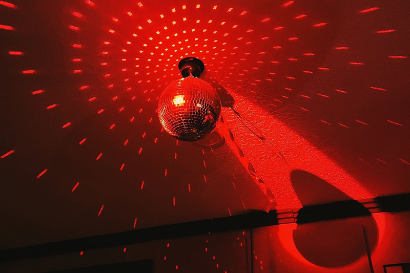 discoball in red lighting